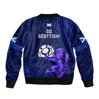 Blue bomber jacket back graphic with Go Scottish! text, purple dragon and wreath