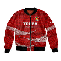 Red bomber jacket with full-zip front, ribbed collar, and Tonga Rugby crest on chest