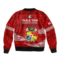 Red bomber jacket with ribbed trim, back crest graphic, and geometric pattern