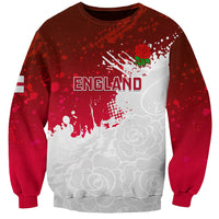 Red England rugby sweatshirt with large white graphic and rose detail, long sleeves