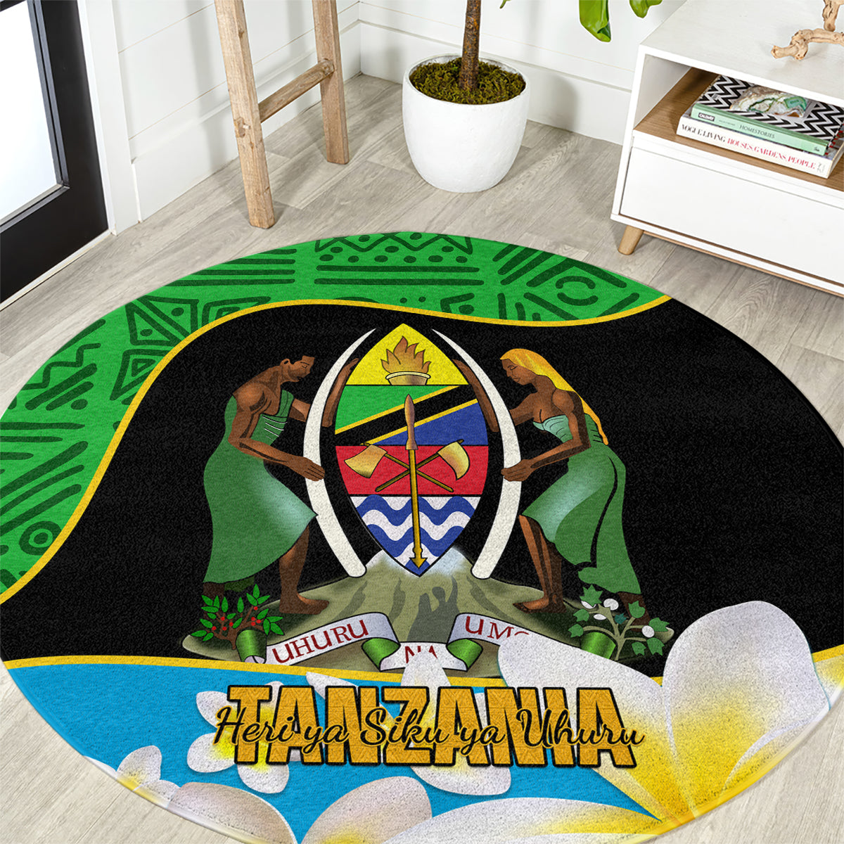 Round green and black African-pattern carpet with emblem, dancers, and 'Uhuru' text