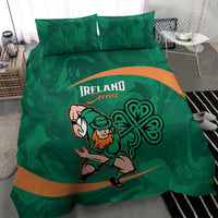 Green duvet and pillowcases with Ireland Sevens logo, rugby mascot, shamrock swirl, orange band.