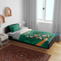 Green bedding set on a wooden bed frame with Ireland Sevens mascot and orange stripe.
