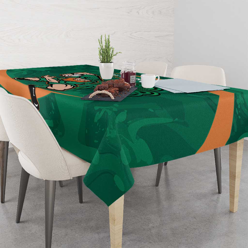 Green Ireland Rugby Sevens tablecloth with Irish shamrock graphic on dining table corner