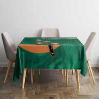 Green Ireland Rugby Sevens tablecloth with Irish shamrock graphic on small dining table