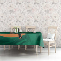 Green Ireland Rugby Sevens tablecloth with Irish shamrock design on long dining table