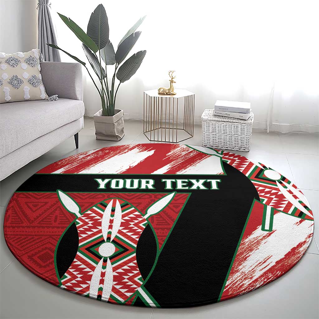 Round area rug with red-green-black-white design and 'YOUR TEXT' across the center