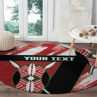 Round area rug with red-and-white brushstroke edges, green-and-black motif, 'YOUR TEXT'