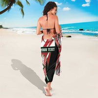 Red, white, and black African-pattern sarong with 'YOUR TEXT' center design