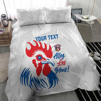 France rugby bedding set on bed, close view of white duvet and pillows with rooster.