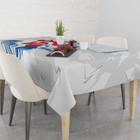 France rugby tablecloth draped on table, rooster graphic with 'Allez les Bleus' text