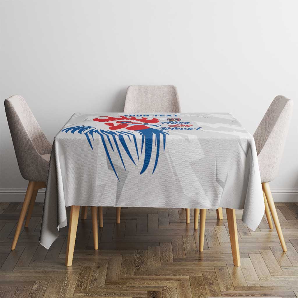 France rugby tablecloth on dining table, blue lightning-style rooster with 'Allez les Bleus'