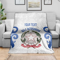 White Italy rugby blanket on a sofa showing blue swirls, crest emblem, and YOUR TEXT