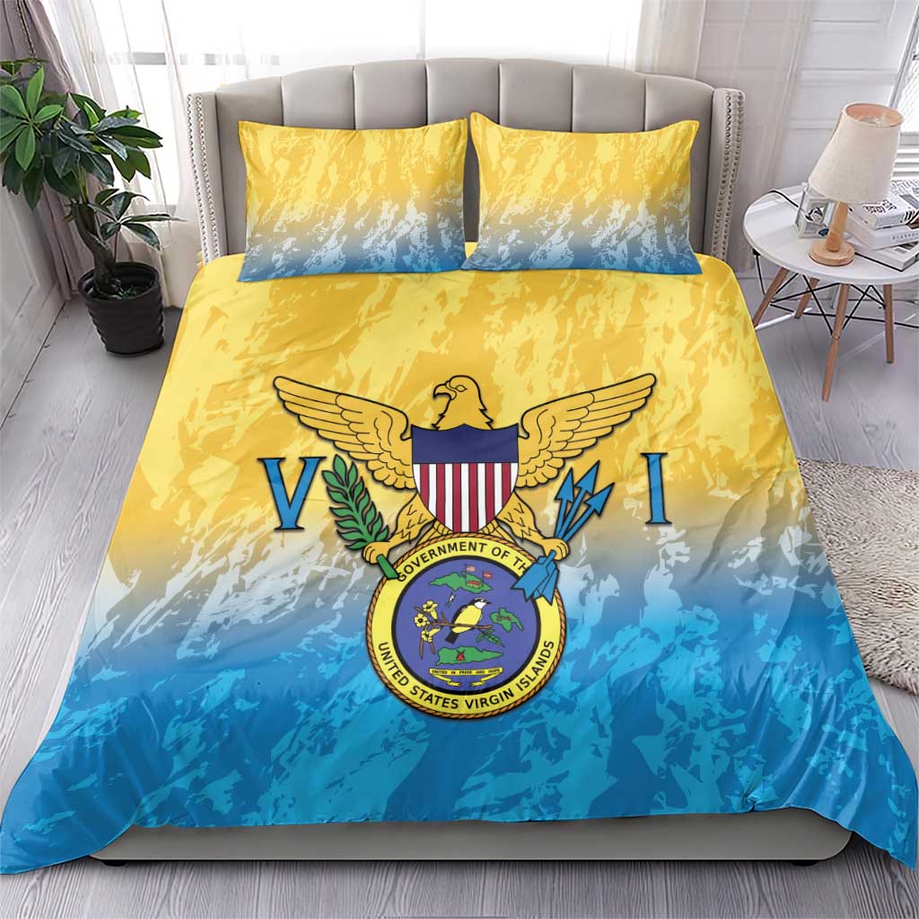 Yellow and blue comforter set with Virgin Islands crest and emblem, two decorative pillows