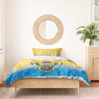 Yellow and blue duvet set with Virgin Islands coat of arms emblem, plus pillow