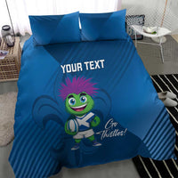 Blue duvet cover set with two pillows; thistle mascot character and 'YOUR TEXT' in middle