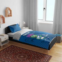 Blue duvet cover set with pillow, thistle mascot artwork and 'YOUR TEXT' printed on duvet