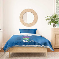 Blue duvet cover with pillow featuring thistle mascot and 'YOUR TEXT' across center