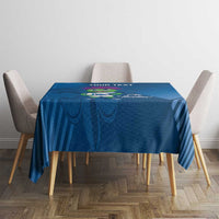 Blue tablecloth with thistle mascot centered on small dining table