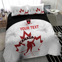 Canada hockey bedding set with white duvet, black top band, red Canada maple leaf goalie graphic