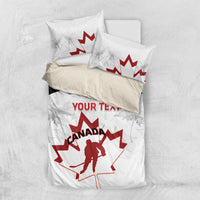 Canada hockey bedding set flat lay: white duvet and pillows with red Maple Leaf goalie graphic