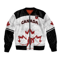 White and black bomber jacket with Canada crest, leaf and full-zip front