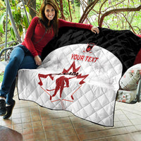 Black-and-white Canada hockey quilt draped on couch with red Canada map and goalie, 'YOUR TEXT'