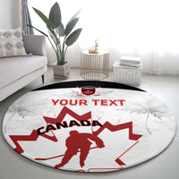 Round carpet with red Canada hockey crest and 'Your Text' over light gray base