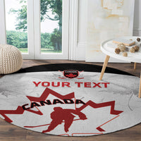 Round carpet with red Canada hockey player silhouette and 'Your Text', black border