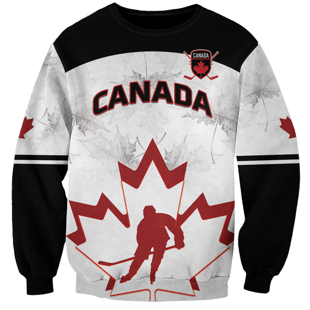 Canada hockey sweatshirt in black/white/red with CANADA logo, maple leaf and goalie graphic