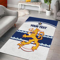 Rectangular blue-and-white area rug showing lion crest in center with 'YOUR TEXT'