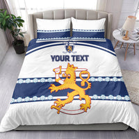 Hockey bedding set on bed: white-and-blue duvet with lion logo, “YOUR TEXT,” and border.