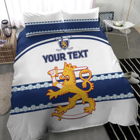 Custom hockey bedding set with white-and-blue duvet, lion emblem, and blue floral border.