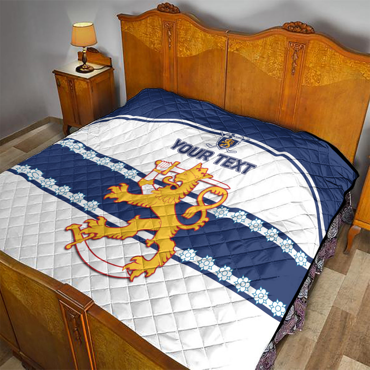Blue and white quilt bedding with quilted pattern, lion crest graphic, “YOUR TEXT”
