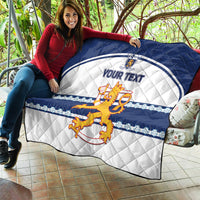 Blue and white quilt with quilted texture, lion crest graphic, and “YOUR TEXT”
