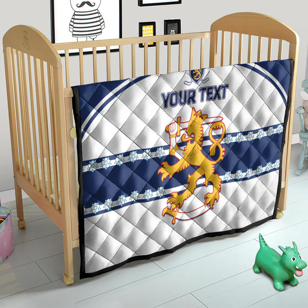 Blue and white baby quilt with quilted diamonds, lion crest, and “YOUR TEXT”