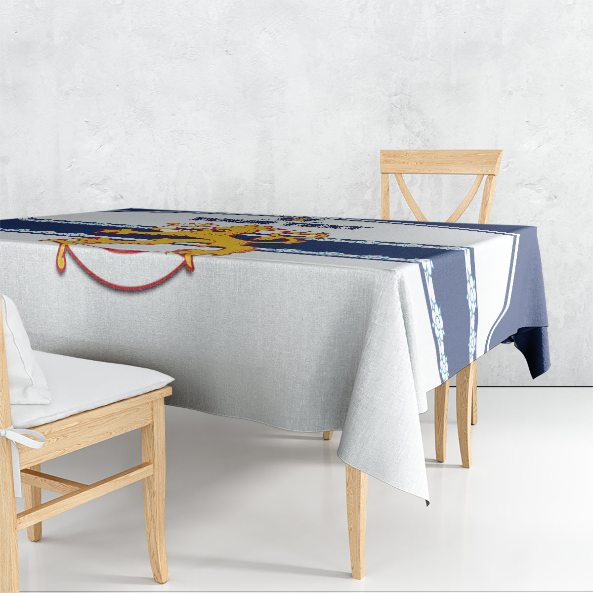 Custom hockey tablecloth draped on dining table with dark blue border stripe and emblem