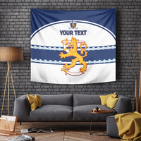 Blue and white wall tapestry showing a circular crest, lion motif, and 'YOUR TEXT' text