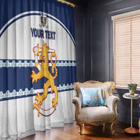 Blue and white hockey curtain panels with crest and custom text in a living room