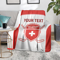 Red and white hockey blanket on sofa with Your Text and Switzerland Ice Hockey emblem
