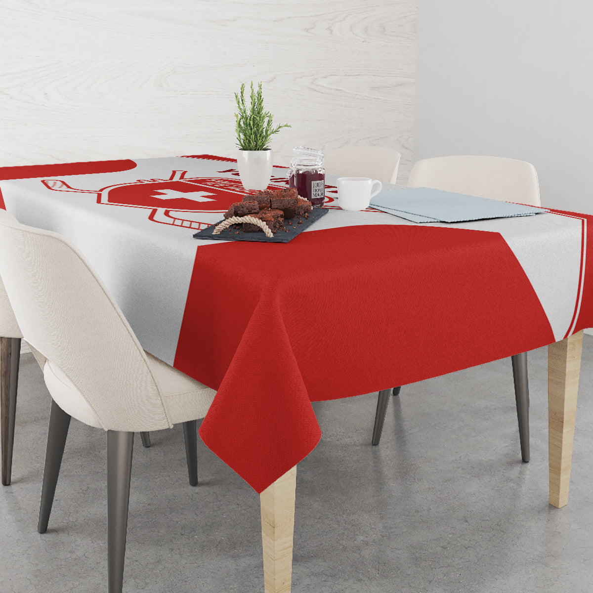 Red and white Swiss hockey tablecloth with crest graphic and hanging corner
