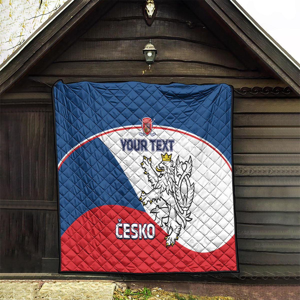 Custom Czech hockey quilt displayed indoors in blue, white, and red with crest and “CESKO”.