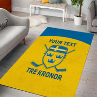 Custom hockey area rug, yellow with blue stripe and 'YOUR TEXT' 'TRE KRONOR' emblem