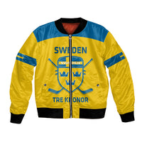 Yellow and blue hockey bomber jacket with zipper, front Sweden crest and hockey-stick graphic