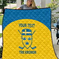 Custom Sweden hockey quilt with blue outer border, yellow center, and Sweden crest