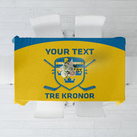 Yellow hockey tablecloth with blue border and crest, centered 'Tre Kronor' design