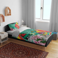Green bedding set with Cameroon flag colors, lion crest, monument tower and pink lily flowers