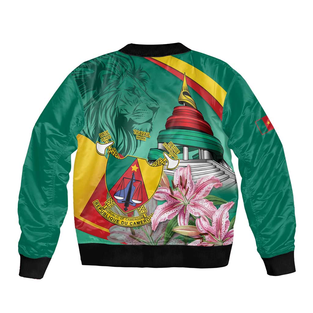 Green bomber jacket with ribbed hem, large crest and lily-style floral graphic