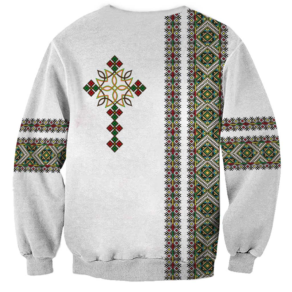 Unisex sweatshirt in light gray with Ethiopian back stripe panels and cross motif