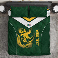 Green bedding set with rhino and crest, yellow trim, white chevron stripe, pillow shams
